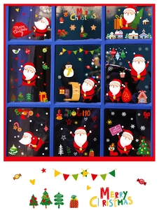 Detail view of static Christmas window stickers with Santa Claus and snowflakes