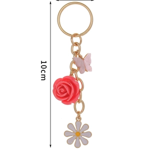 Fashionable 10cm gold keychain with red resin rose, pink butterfly, and daisy pendants