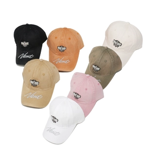 Washed cotton baseball caps in 7 colors featuring bee and Vent letter embroidery