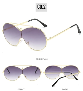 Detailed views of oversized gold frame sunglasses with purple gradient lenses from three angles