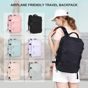 Airplane friendly travel backpacks shown in six colors with a model outdoor scene