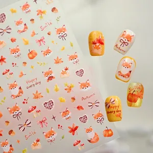 Cartoon autumn fox nail stickers with maple leaves, pumpkins and hand-drawn patterns