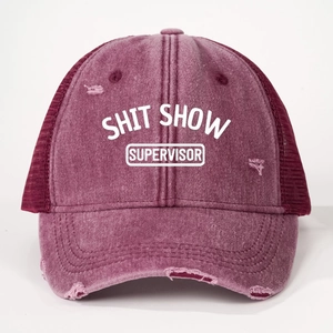 Detail of distressed maroon trucker hat with SHIT SHOW SUPERVISOR print and mesh back