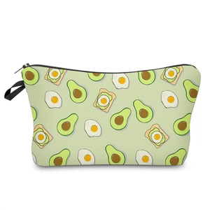 Close-up of waterproof makeup bag featuring 3D avocado and fried egg cartoon prints
