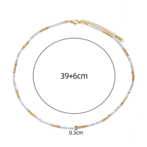 Detail of two-tone beaded chain with lobster clasp, 39+6cm length and 0.3cm gold silver beads
