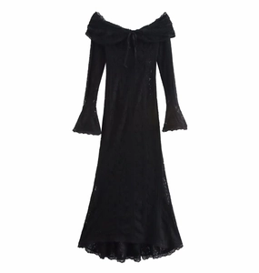 Detailed view of black off-shoulder lace dress with flared sleeves and lace-up front design