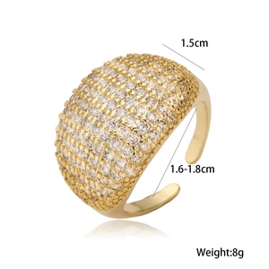Detailed macro view showing dimensions of a wide gold ring with pavé heart cubic zirconia