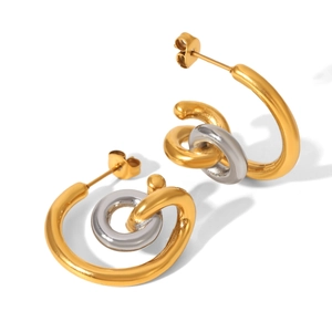 Two-tone gold and silver C-shaped twisted stainless steel earrings on white background