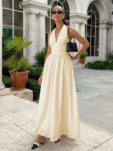 Elegant beige V-neck cotton maxi dress with waist tie and flowing skirt for summer holidays