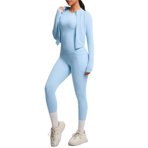 Three-piece light blue yoga set with zipper jacket and high waist pocket leggings