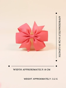 Detail view of 8cm pink grosgrain ribbon bow clip showing dimensions and weight metrics