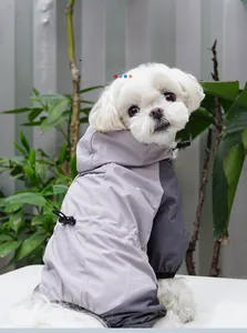 Waterproof dog raincoat featuring contrast grey panels and an adjustable drawstring hood