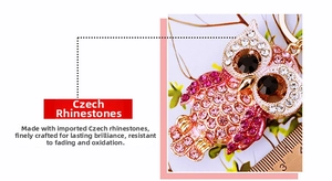 Detailed view of rhinestone owl keychain showing dimensions with a ruler scale