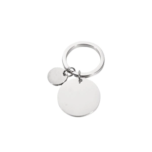 Polished stainless steel round disc keychain with large and small pendants on white background