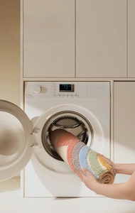 Machine washable rainbow striped bathroom mat with durable non-fading woven texture