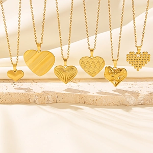 Elegant 18K gold plated heart pendant necklaces in six diverse textures on stone base