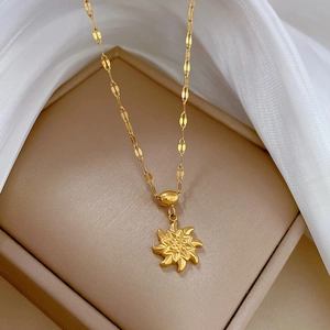 Titanium steel golden necklace featuring a spinning sunflower pendant on a textured chain