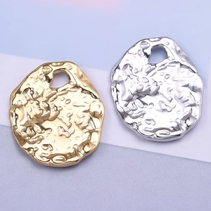 Irregular 304 stainless steel hammered oval pendants in gold and silver finishes