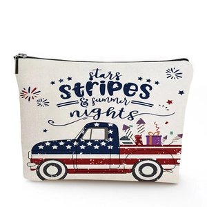Linen pouch detail showing vintage truck and US flag print with summer nights text