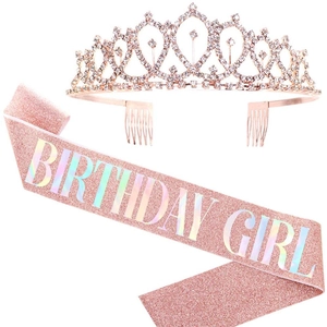 Detail of rose gold rhinestone tiara and pink glitter sash for birthday party gift