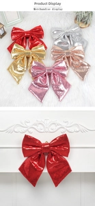 Close-up of sparkling sequined Christmas bows in red and gold for festive tree decoration