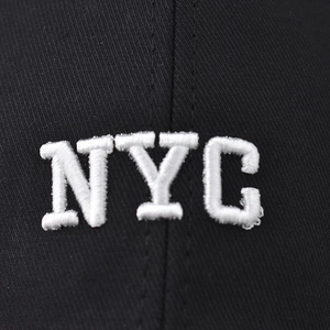 Classic black NYC baseball cap featuring white 3D letter embroidery in twill cotton