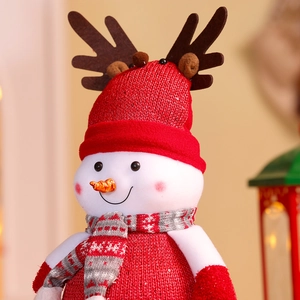 Christmas foam snowman doll with red knitted hat, reindeer antlers and striped scarf