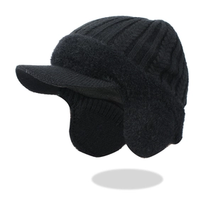 Close-up of black cable knit winter hat with fleece lining and ear flaps for men