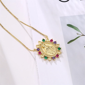 Detail of Virgin Mary pendant necklace with colorful cubic zirconia and gold box chain