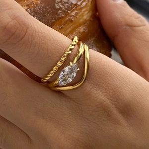 Gold stainless steel stackable ring set with marquise cut crystal and twisted band