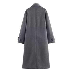 Back view of long dark grey wool coat with adjustable buttoned cuffs and thick texture