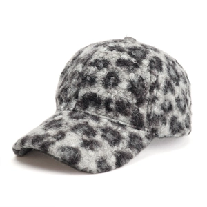 Close-up of leopard print leopard lamb wool baseball cap showing thick fuzzy texture