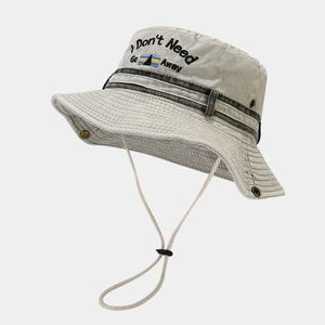 Close-up of vintage denim bucket hat with letter embroidery and adjustable chin strap