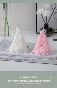 Artistic human-shaped scented candles with detailed fabric textures for home decor
