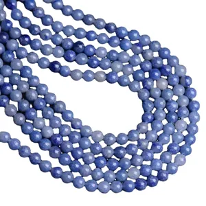 Natural blue lapis lazuli round stone beads for DIY jewelry making displayed in rows