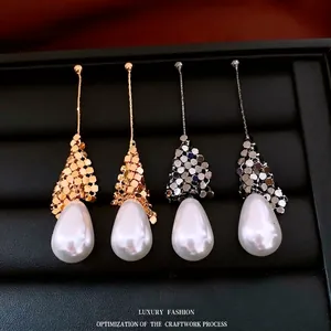 Elegant 18k gold plated silver needle drop earrings with pearl tassels in gold and silver