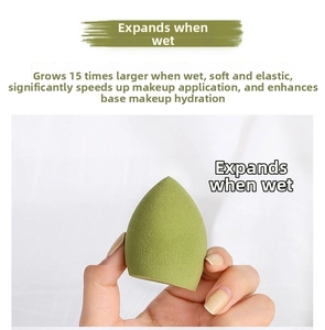 Detail showing soft green makeup sponge expanding to 1.5 times size when wet