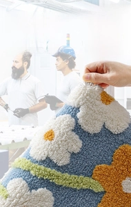 Close-up of high-density tufted floral bathroom mat showing durable non-shedding fibers