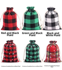 Detailed view of six Christmas plaid drawstring bags in various patterns and colors