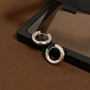 Polished silver stainless steel hoop earrings with mirror finish in minimalist style