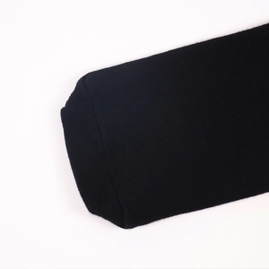 Mid-calf cotton sports socks in black featuring a non-slip textured knit texture