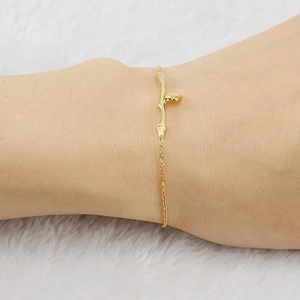 Elegant 18K gold-plated stainless steel bracelet featuring heart charm and branch design