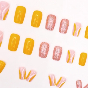 Orange and glitter striped handmade press-on nail kit with vibrant wavy art design