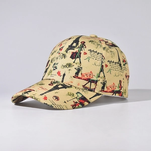 Detail of beige baseball cap with Eiffel Tower print and vintage fashion illustrations
