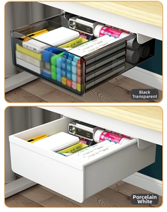 Detail view of white and smoke grey under-desk drawers installed on a wooden table surface