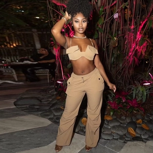 Detail of khaki two-piece set featuring cropped camisole top and drawstring cargo pants