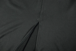 Close-up of the elegant black sleeveless maxi dress featuring a detailed side slit and stitching