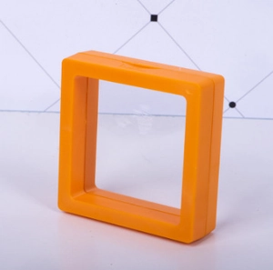 Detail view of square orange PE film jewelry display box showing film transparency