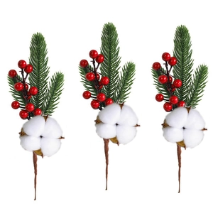 Detailed view of Christmas berry stems with pine needles and natural white cotton