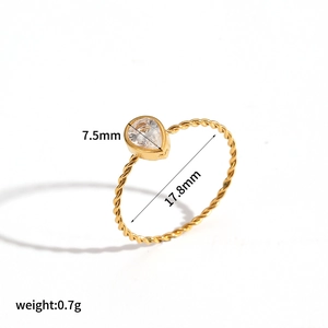 Detail of gold water drop ring with twisted rope band, showing 7.5mm stone height and size